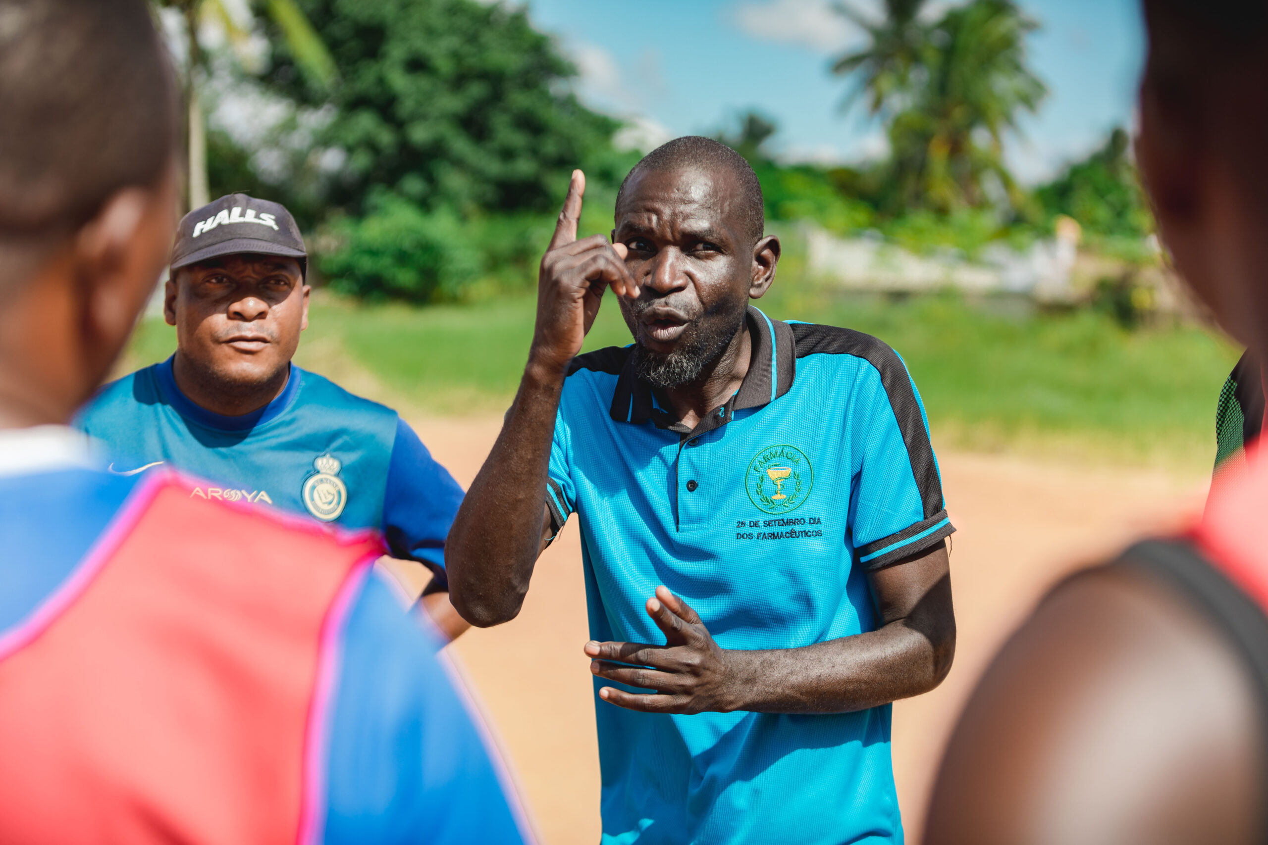 Coaches in discussion during the Massinga course