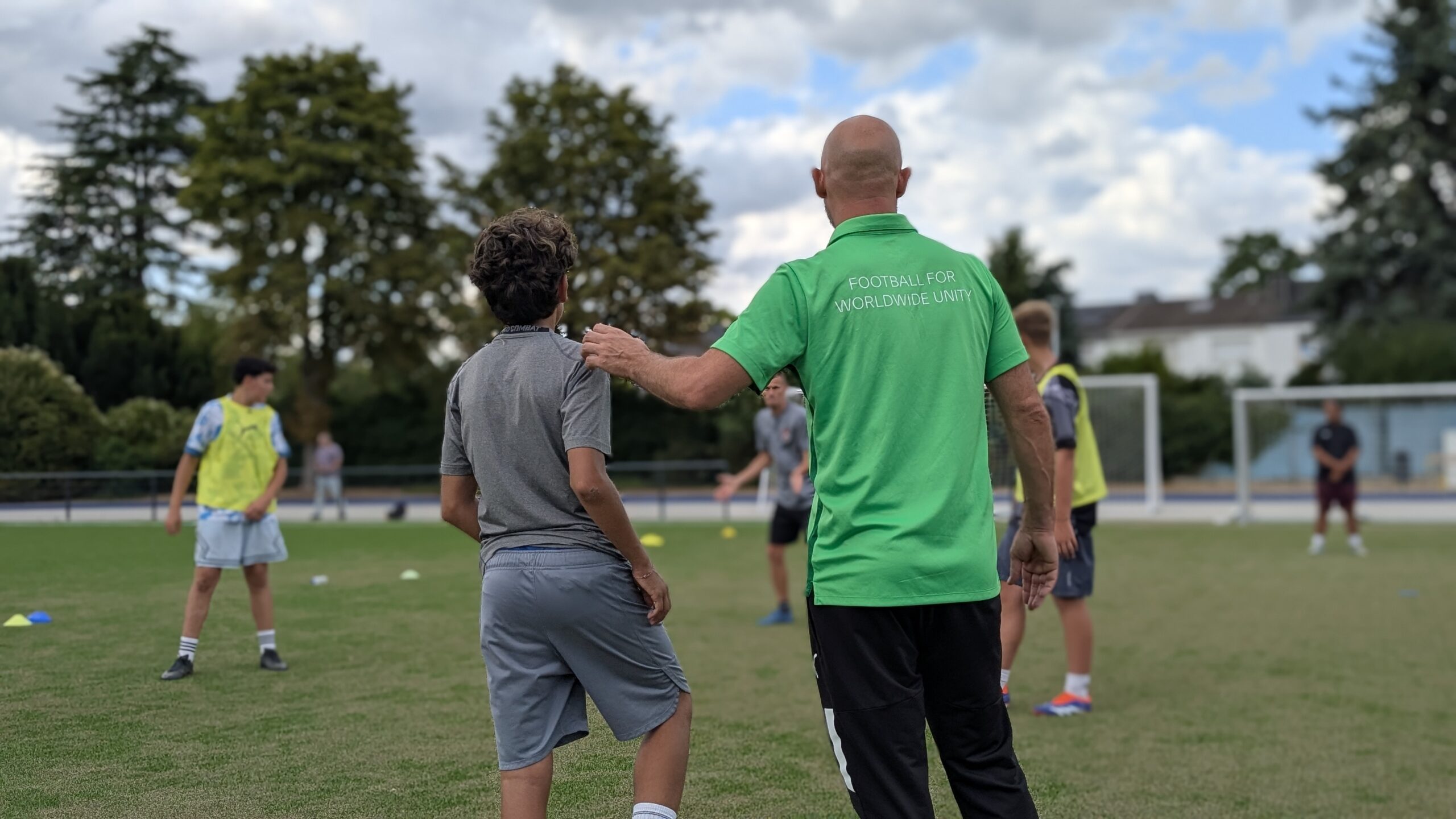 Coach at the Together Through Football camp