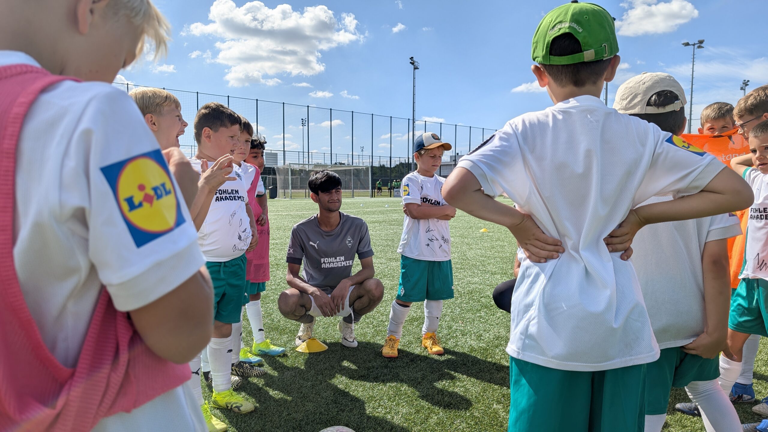 Coach leading a session at the Together Through Football camp